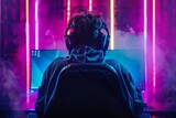Cyber Champion in the Making: Young Pro Gamer Streams Online Match with Skill & Focus. Neon Lights Set the Stage for Epic Esports Competition.