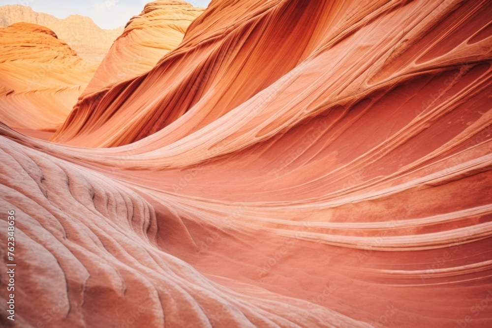 A large wave of sand in a canyon, suitable for nature backgrounds