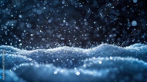 An isolated black background with falling snow in the winter