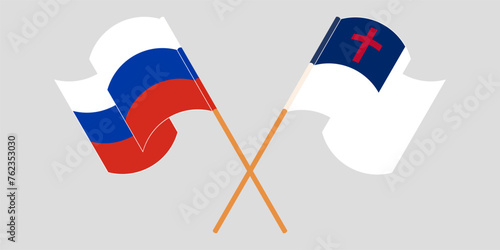 Crossed and waving flags of Russia and christianity