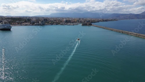 Aerial top view by drone of Heraklion city with old harbor.