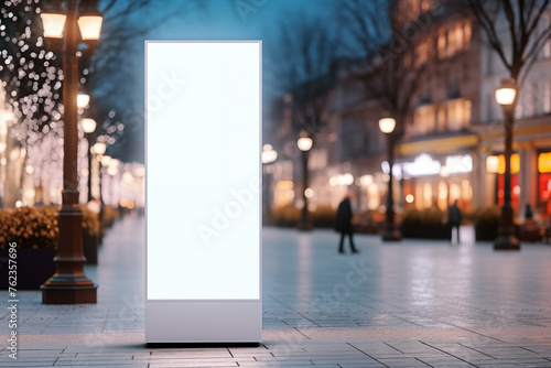 Blank billboard on the street at night, mock up for design photo
