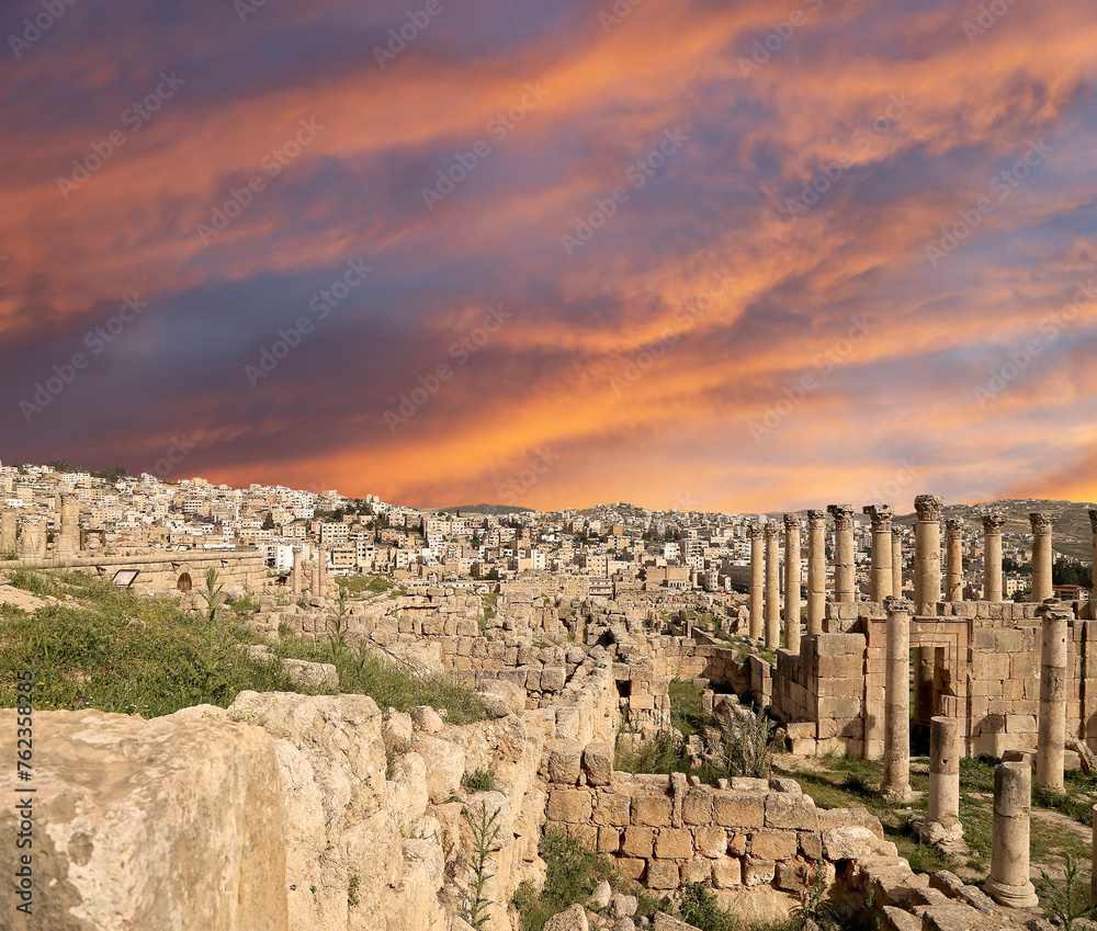 Roman ruins (against the background of a beautiful sky with clouds) in the Jordanian city of Jerash (Gerasa of Antiquity), capital and largest city of Jerash Governorate, Jordan