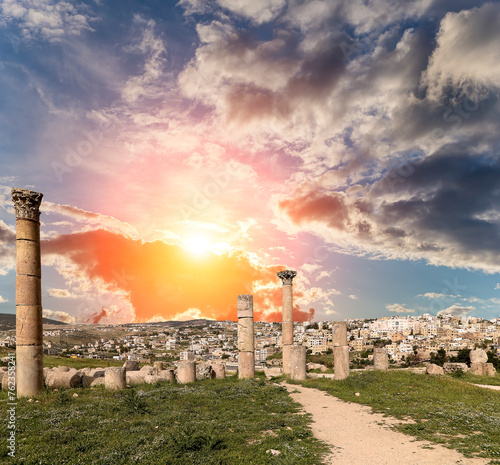 Roman ruins (against the background of a beautiful sky with clouds) in the Jordanian city of Jerash (Gerasa of Antiquity), capital and largest city of Jerash Governorate, Jordan #762358241