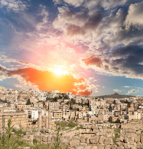 Roman ruins (against the background of a beautiful sky with clouds) in the Jordanian city of Jerash (Gerasa of Antiquity), capital and largest city of Jerash Governorate, Jordan