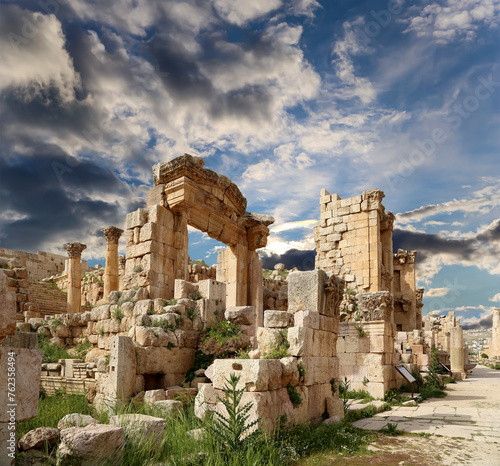 Roman ruins (against the background of a beautiful sky with clouds) in the Jordanian city of Jerash (Gerasa of Antiquity), capital and largest city of Jerash Governorate, Jordan