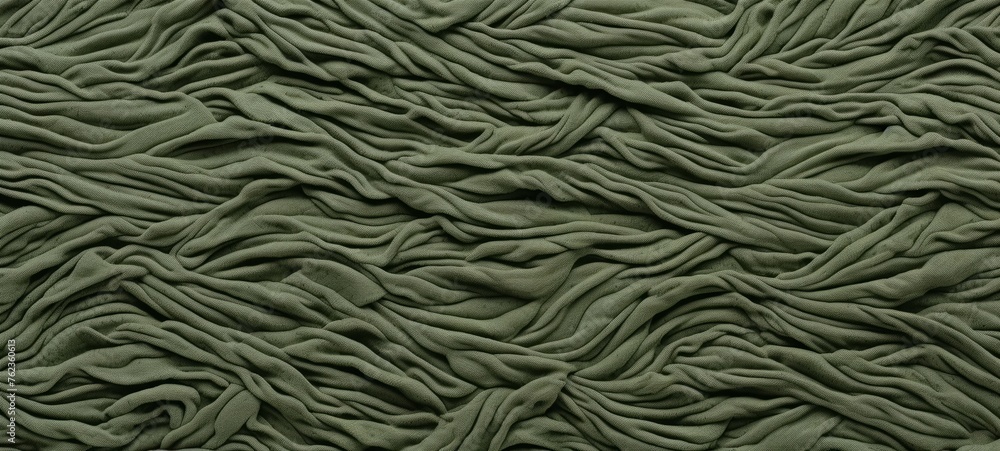 Beautiful smooth wavy army khaki green crumpled cotton fabric texture, abstract background design pattern, top view Beautiful smooth wavy army khaki green crumpled cotton fabric texture, abstract background design pattern, top view