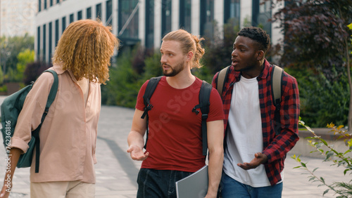 Fotografija Group of mad emotional students multiracial friends Caucasian man guy with Afric