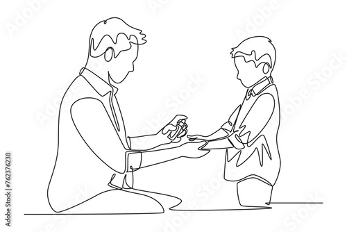 Single continuous line drawing of father sprays hand sanitizer on child's hands. Medical health care service workers concept one line draw design vector illustration