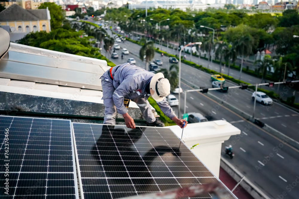 Engineers with solar panels project. Engineers and workers inspecting solar cells Engineers with solar panels project. Engineers and workers inspecting solar cells