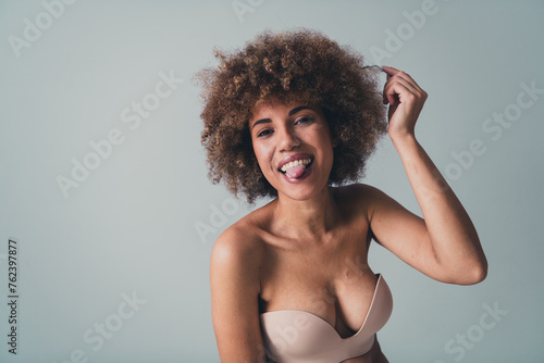 Unretouched photo of carefree girl stick tongue out all haters body shaming people love natural