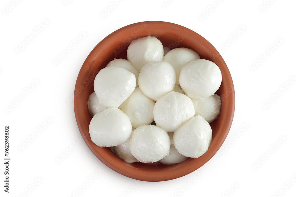 Mini mozzarella balls in a ceramic bowl isolated on white background with full depth of field. Top view. Flat lay. Mini mozzarella balls in a ceramic bowl isolated on white background with full depth of field. Top view. Flat lay.