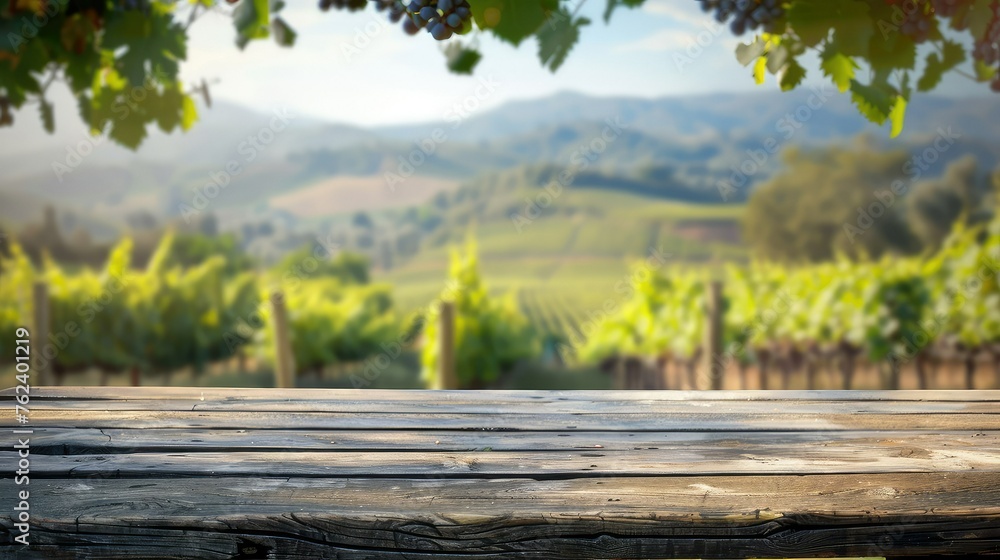 An empty wooden table with benches sits on an outdoor terrace overlooking the Tuscan vineyards An empty wooden table with benches sits on an outdoor terrace overlooking the Tuscan vineyards