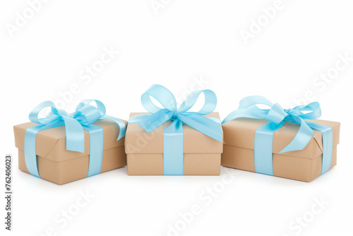 Festive gift boxes decorated with shiny bows isolated on white background