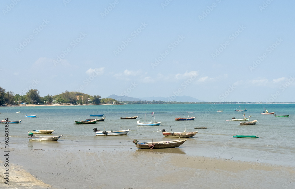 small fishing boat is moored on the ground small fishing boat is moored on the ground