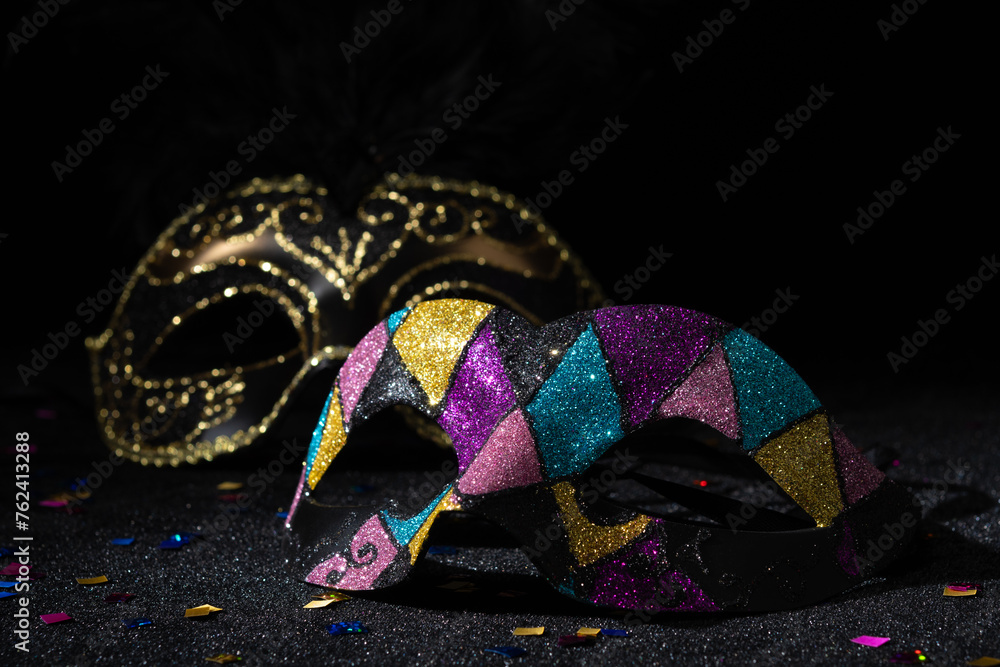 Fototapeta premium Carnival Party. Venetian Masquerade masks on black background.