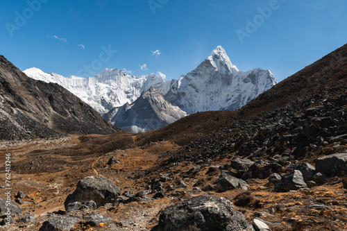 Ama Dablam and Chamlang mounts and Chukhung glacier on descent from Kongma La Pass during Everest Base Camp EBC or Three Passes trekking in Khumjung, Nepal. Highest mountains in the world.