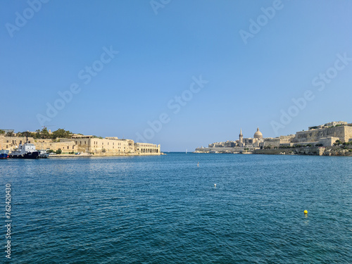 Marsamxett Harbour, Malta - September 18th 2020: The harbour in between the Lazzaretto quarantine facility on Manoel Island and the fortified capital city of Malta. photo