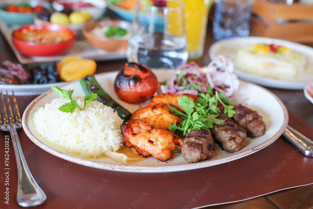 Turkish Kebab Assortment (Set) with green and grilled meats and vegetables Turkish Kebab Assortment (Set) with green and grilled meats and vegetables