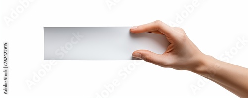 A hand holding a silver paper isolated on white background, elements, crisp and clean lines