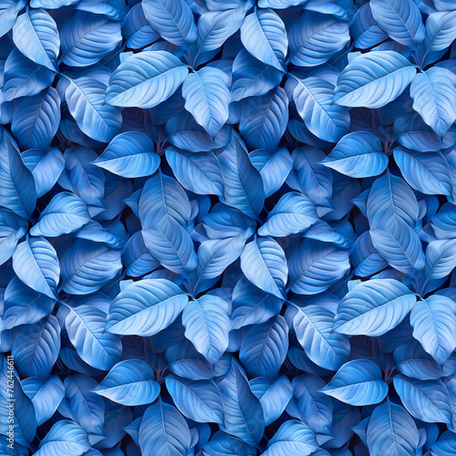 Seamless pattern of blue leaves on a dark background, suitable for fabric or wallpaper design.