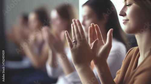 Close-Up of Women's Hands Applauding in Office