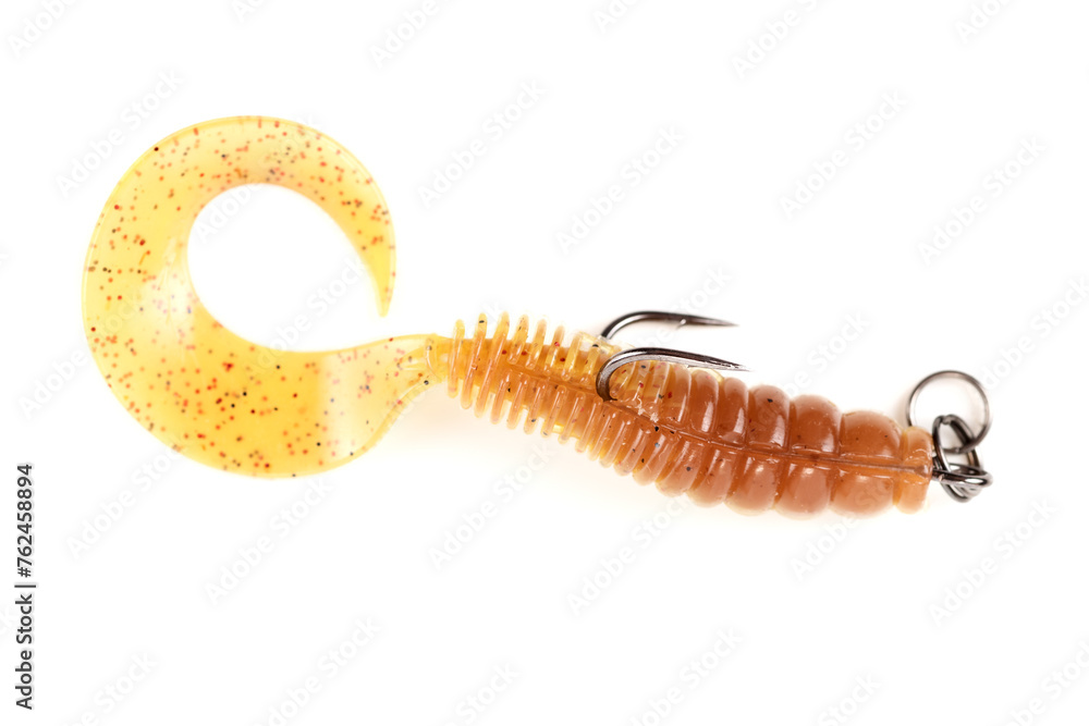 Obraz premium Yellow silicone grub, fishing lure with double hook, isolated on white
