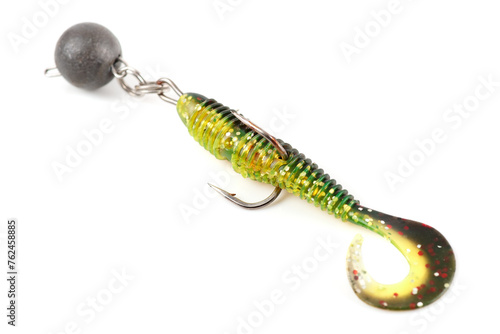 Soft fishing bait, moss green plastic grub, with double hook and lead sinker, isolated on white photo