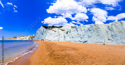Best scenic beaches of Cephalonia (Kefalonia) island - colorful orange Xi beach. Ionian islands of Greece