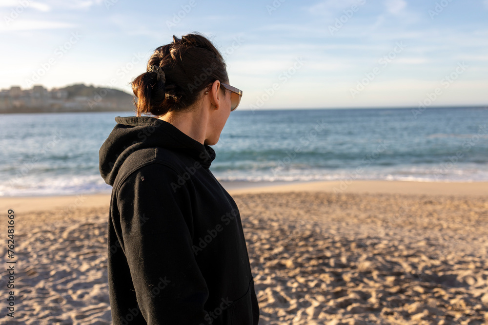 Contemplation at Dusk: A Moment of Seaside Reflection Contemplation at Dusk: A Moment of Seaside Reflection