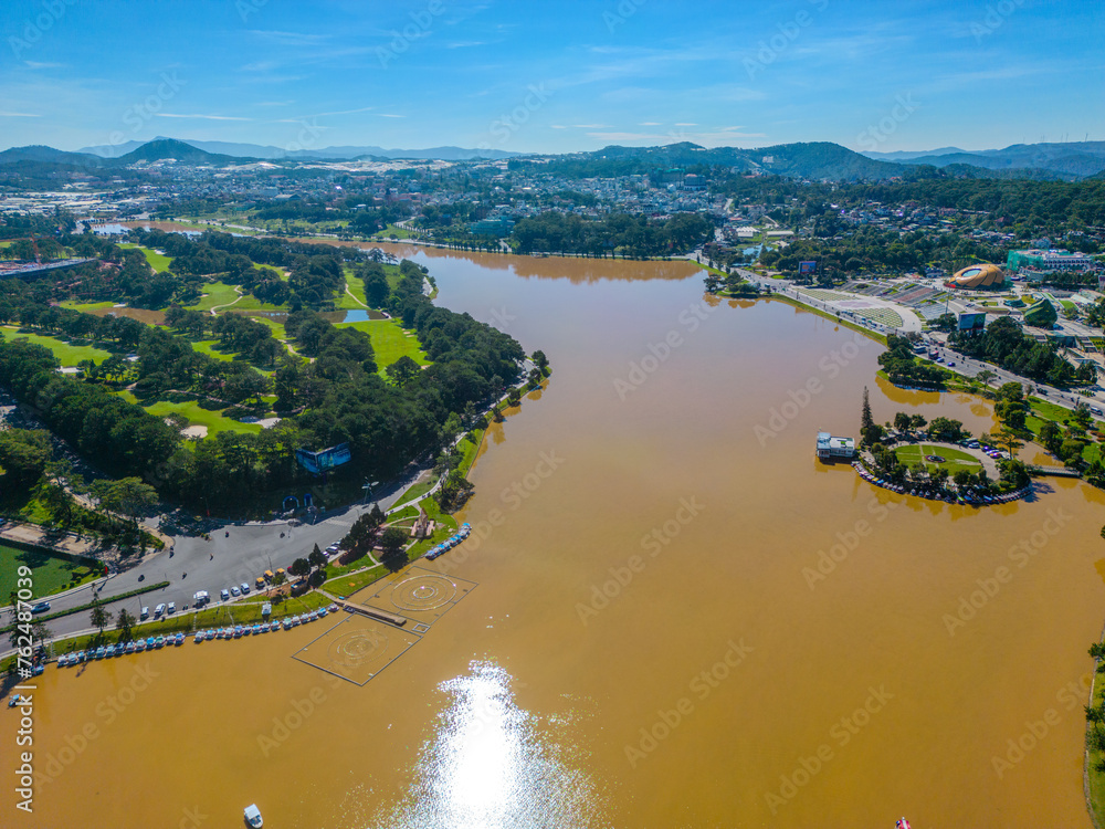 Fototapeta premium Aerial View of Tuyen Lam Lake in Dalat, Vietnam, with Urban and Natural Landscapes