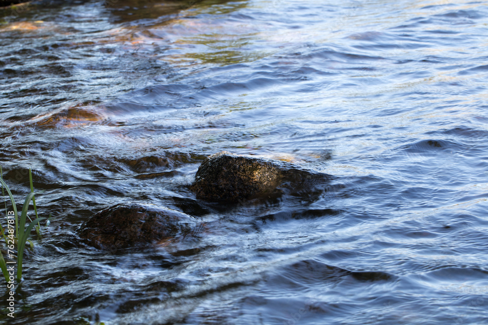 Spring background Stream of water in the forest Spring background Stream of water in the forest