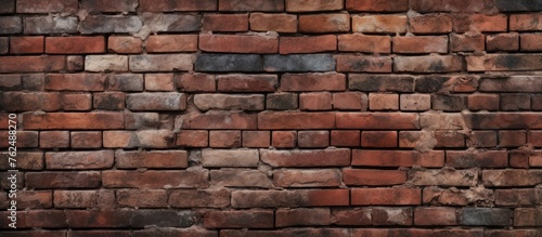 A detailed closeup of a brown brick wall showcasing a rectangle pattern of building material. The composite fixture highlights the intricate brickwork