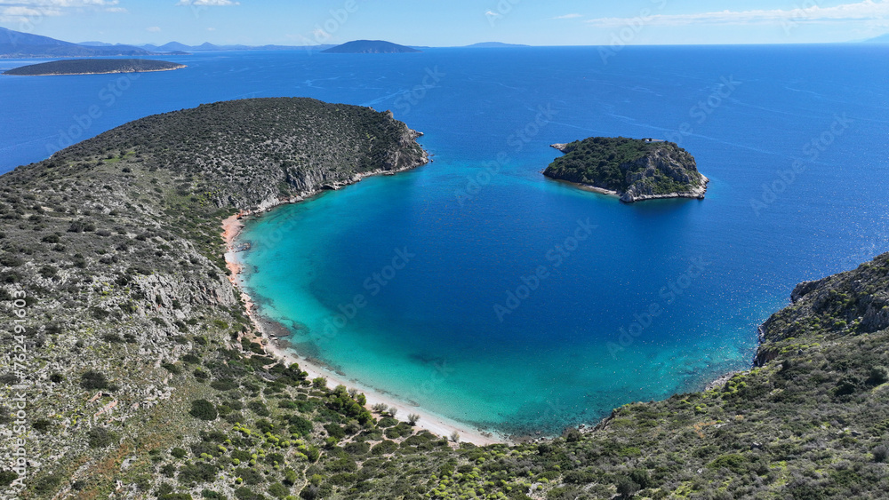 Aerial drone photo of small exotic island and secluded beach of Romvi next to famous seaside village of Tolo, Argolida, Peloponnese, Greece