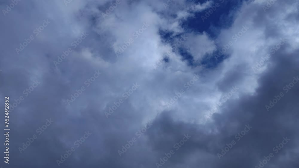 Large dark altocumulus clouds in the sky Large dark altocumulus clouds in the sky