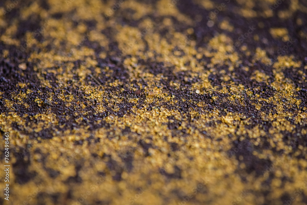 macro photo surface of a concrete inlet purple with yellow splashes background macro photo surface of a concrete inlet purple with yellow splashes background