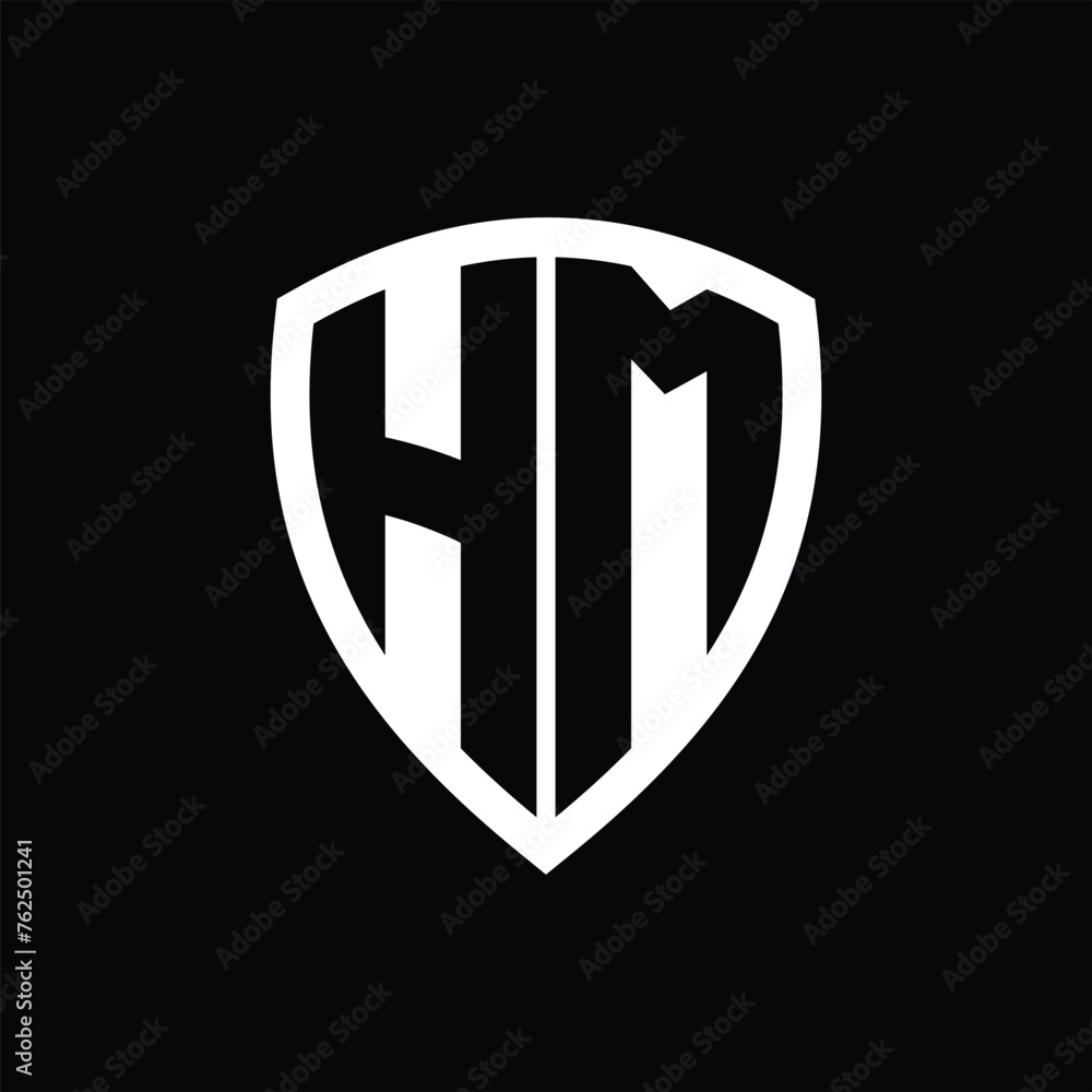 HM monogram logo with bold letters shield shape with black and white color design HM monogram logo with bold letters shield shape with black and white color design