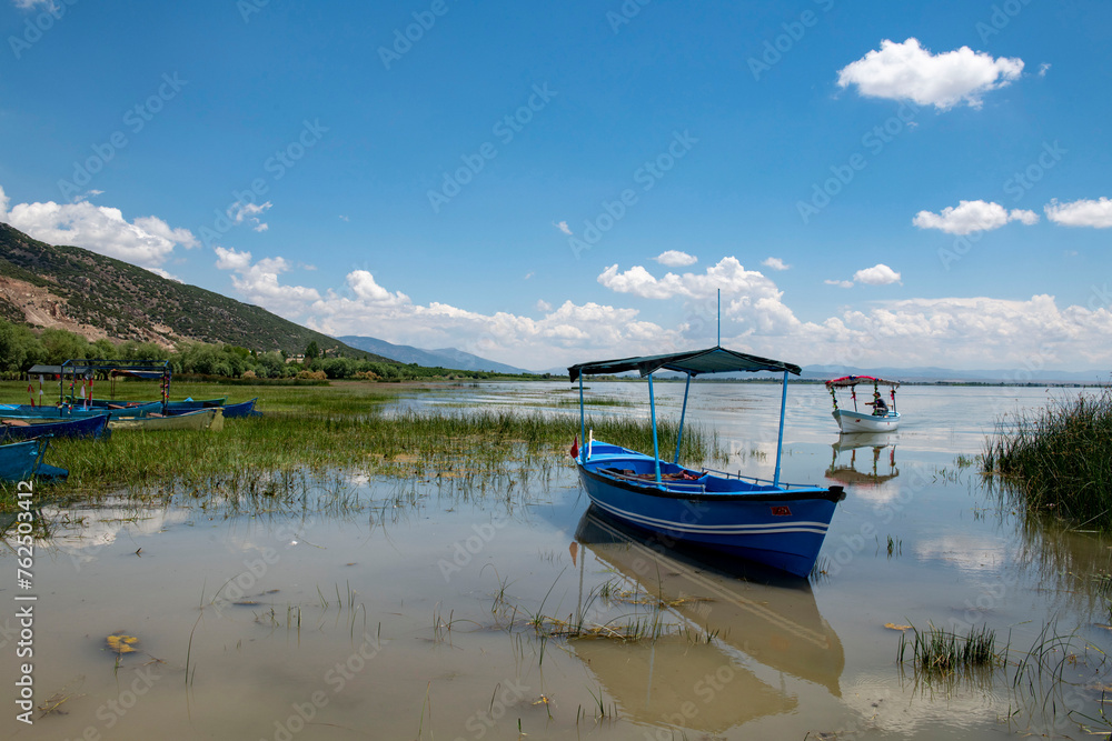 Decorated day-trip boats in Isikli Lake in Denizli's Civril district. Isıkli Lake is flooded with visitors during lotus time. It is also a popular lake for hunters.