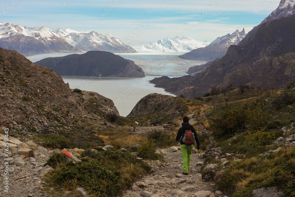 Hiker on the trail in Torres del Paine national park in Chilean Patagonia