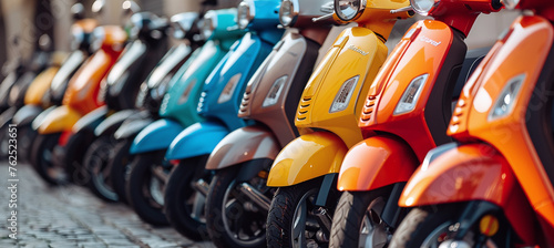 row of scooters of different colors