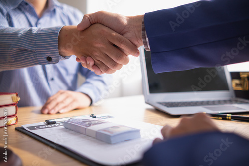 The concept of defendants in serious cases bribing officials involved in court decisions to change the course of case by giving bribes to facilitate the Lawyer team and prosecutors. bribery concept