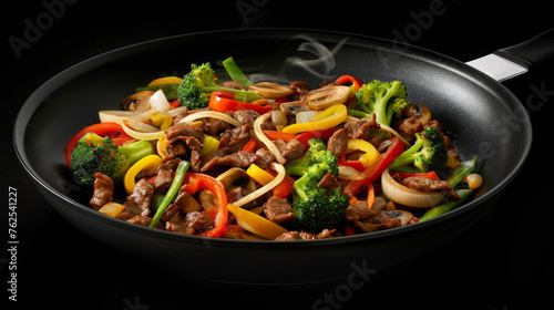 A steaming pan contains beef stir-fry with vibrant broccoli and bell peppers.