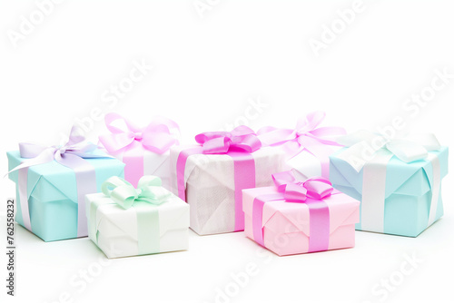 Festive gift boxes decorated with shiny bows isolated on white background
