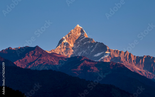 landscape view of snow covered mount Machhapuchhre in Nepal. 