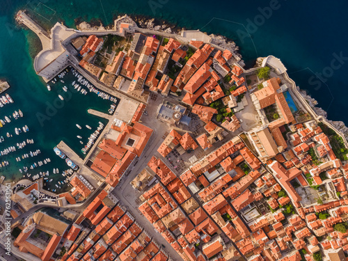 Aerial top down view of old town of Dubrovnik, Dalmatia, Croatia. Medieval city fortress on the coast of Adriatic sea. Drone shot. Travel destination