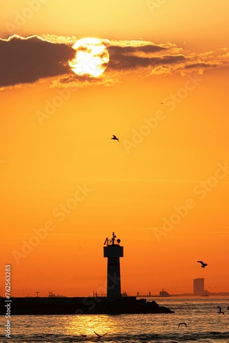 Fototapeta Naklejka Na Ścianę i Meble -  lighthouse at sunset