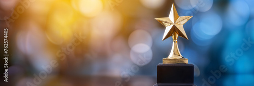 Golden award trophy star on a bokeh background, space for text, copyspace banner winner and 1st place concept, hd photo