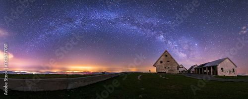Milky Way over the abandoned buildings at the top of Picon Blanco, in Espinosa de los Monteros, Burgos, a cloudless night with a starry sky