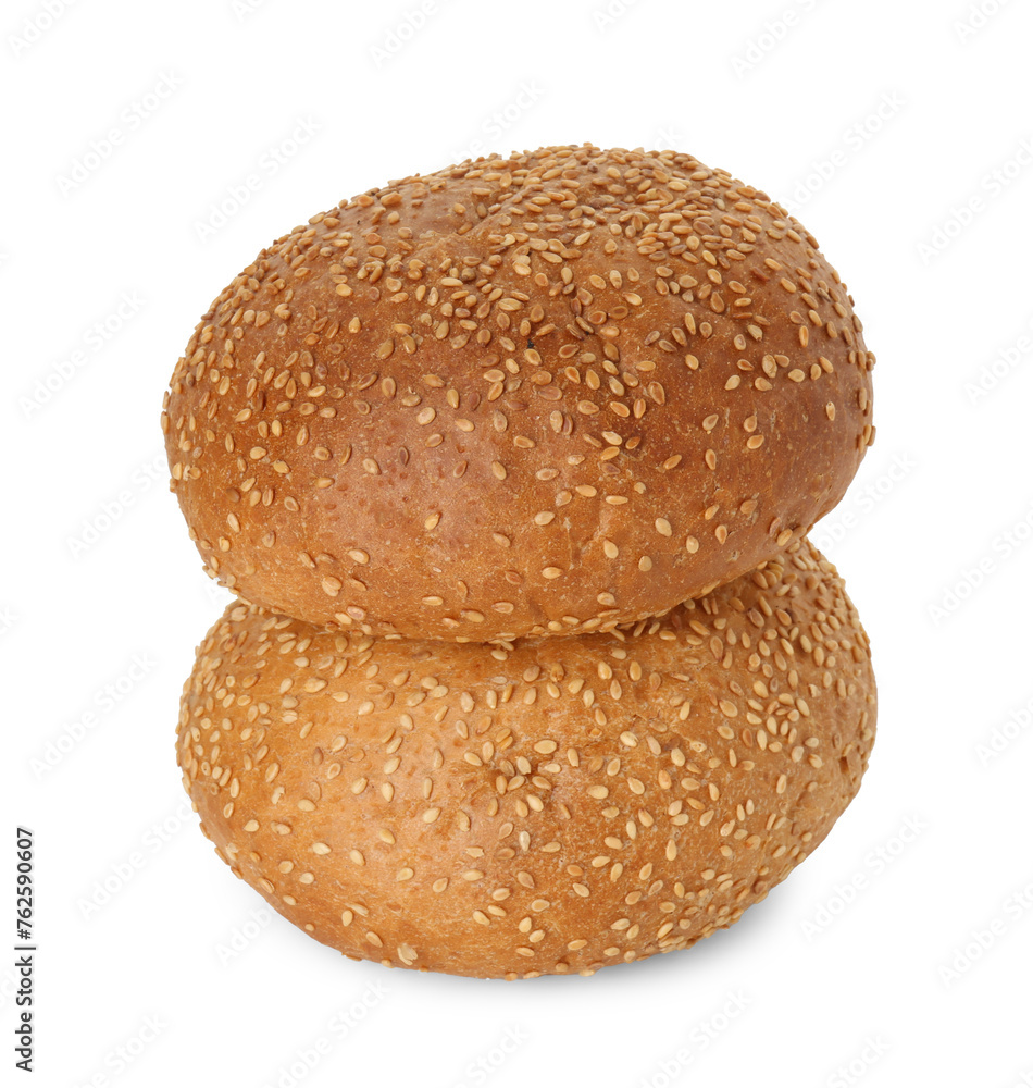 Two fresh hamburger buns with sesame seeds isolated on white Two fresh hamburger buns with sesame seeds isolated on white
