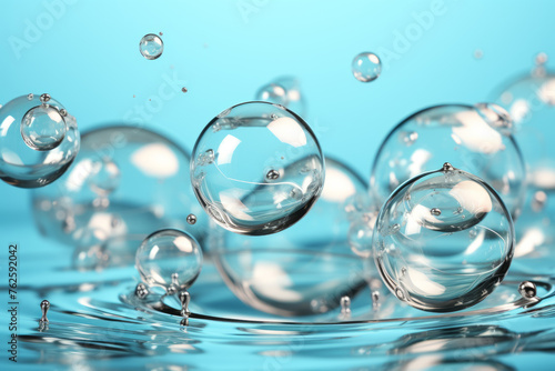 Splash of water with many clear bubbles floating on top. Bubbles are of different sizes and are scattered throughout water. Concept of movement and fun  as if water is alive